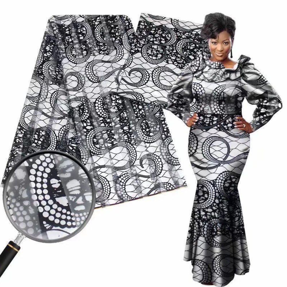 Beautiful black and white Organza fabric for dress, party dress and top.